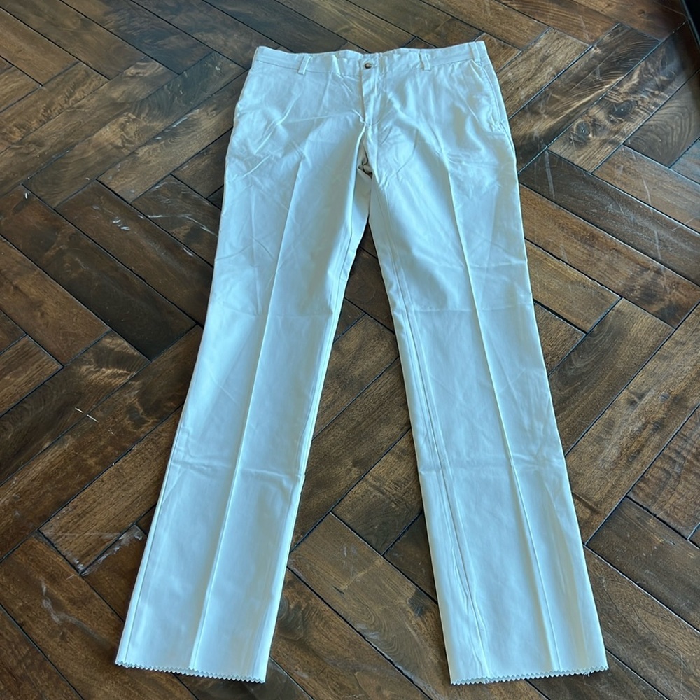 Frank’s pants made is USA 37% poly; 32%tencel;31%cotton trim fit stone trouser